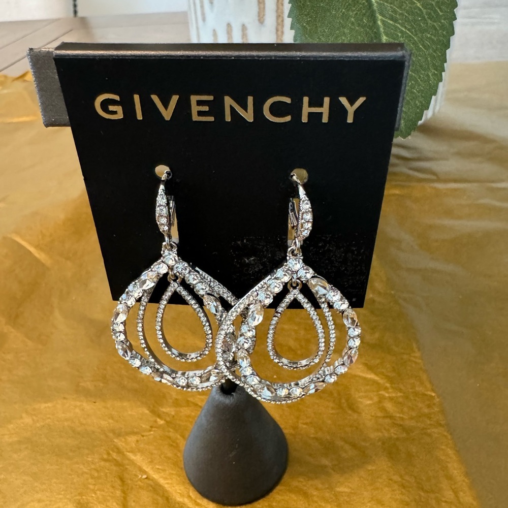 Silver tone earrings with CZ’s by Givenchy. NWT